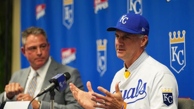 Nov 3, 2022; Kansas City, Missouri, USA; Kansas City Royals manager Matt Quatraro (33) and general manager J.J. Picollo talk with media during a press conference at Kauffman Stadium. Mandatory Credit: Jay Biggerstaff-USA TODAY Sports
